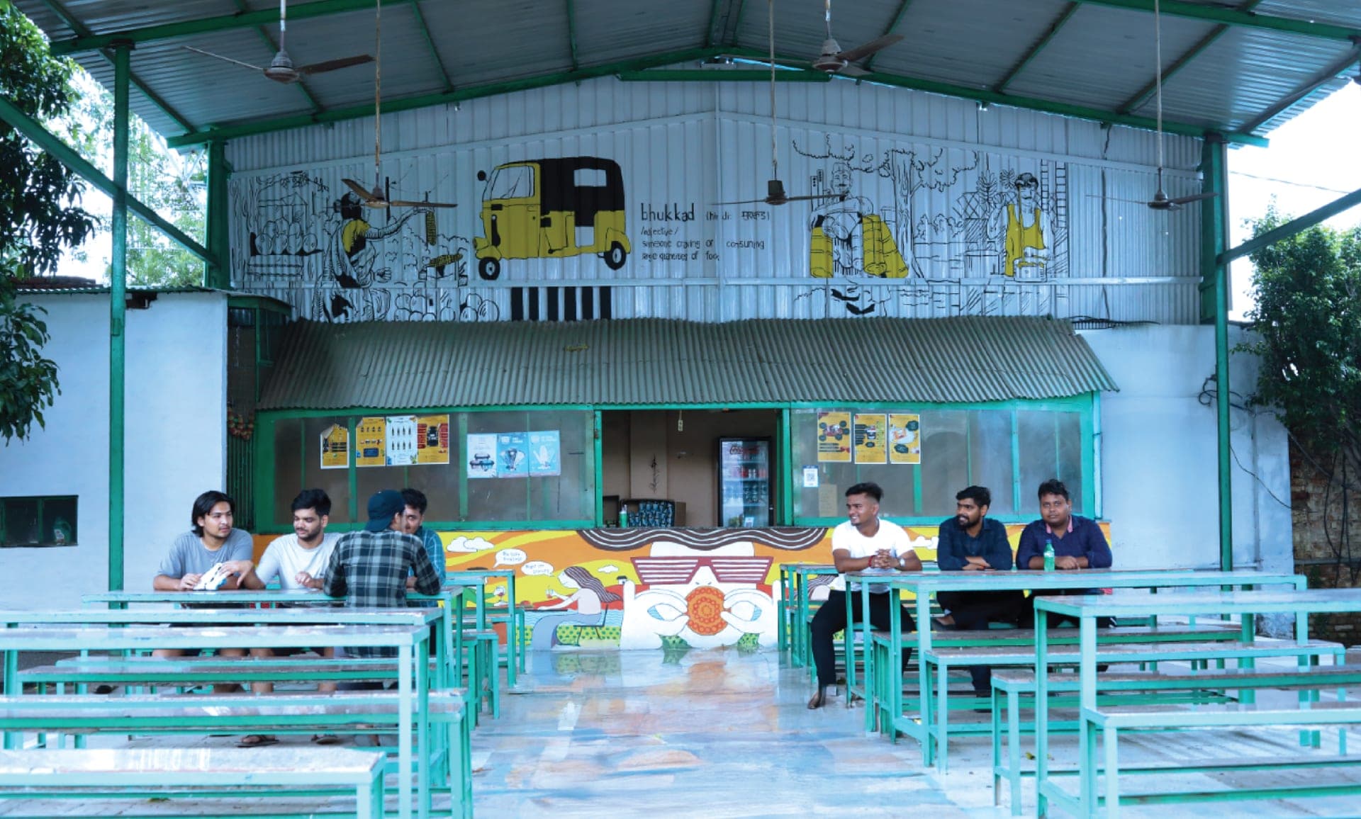 Students at the outdoor canteen with murals, Hi-Tech Institute Ghaziabad