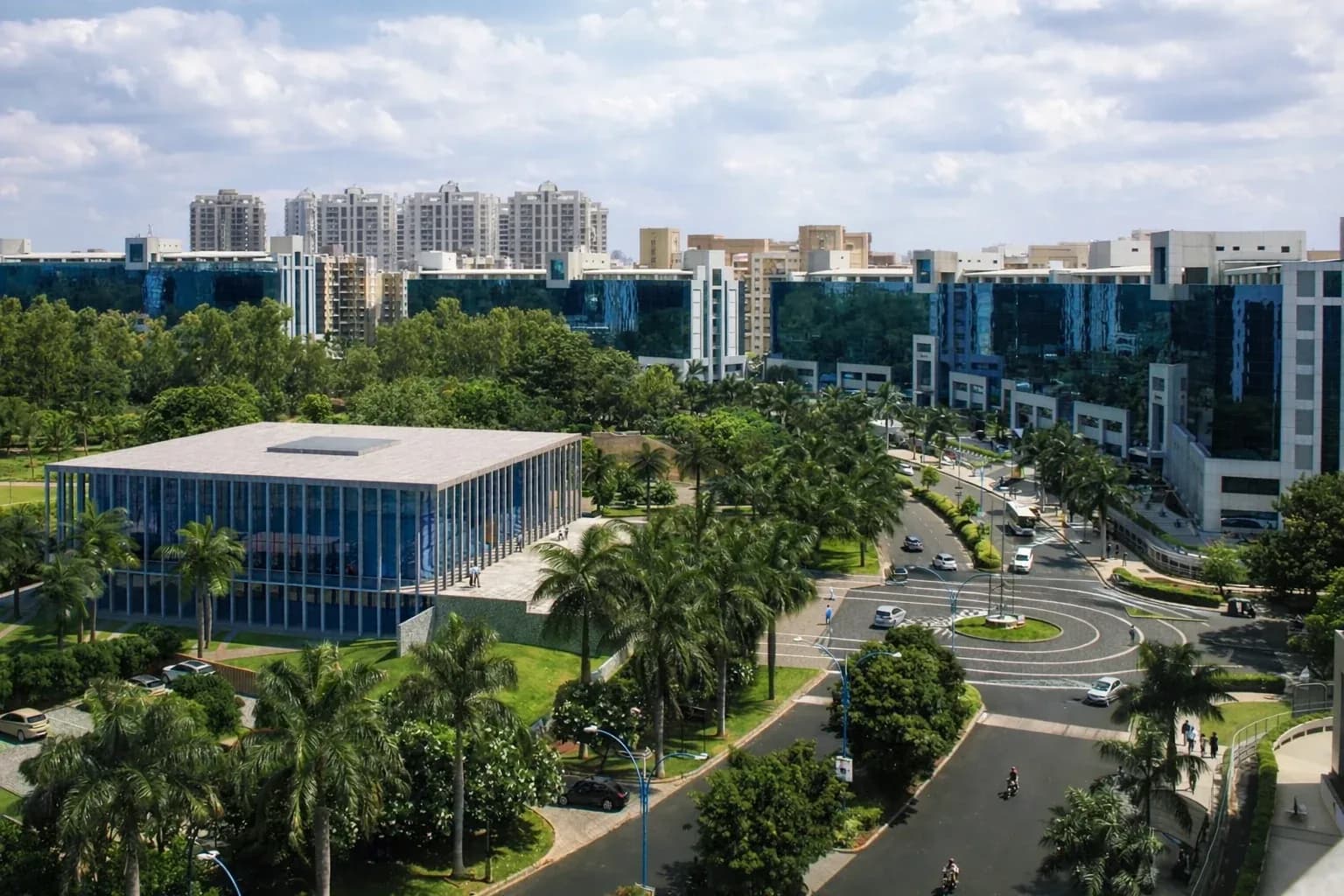 Aerial view of an IT park in Pune with palm-lined roads