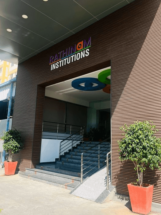 Rathinam Institutions main building entrance with stairway and landscaping