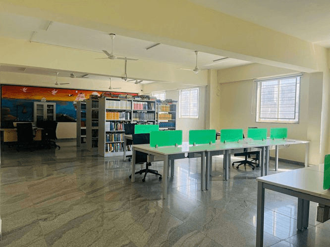 Library with reading desks and bookshelves at Rathinam School of Business, Bangalore