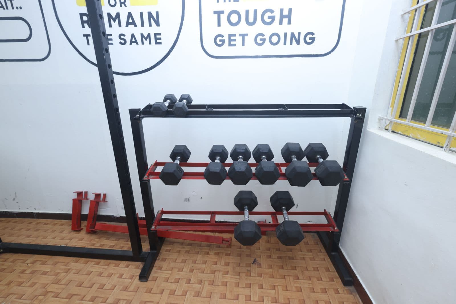 Dumbbell rack at Rathinam boys hostel gym